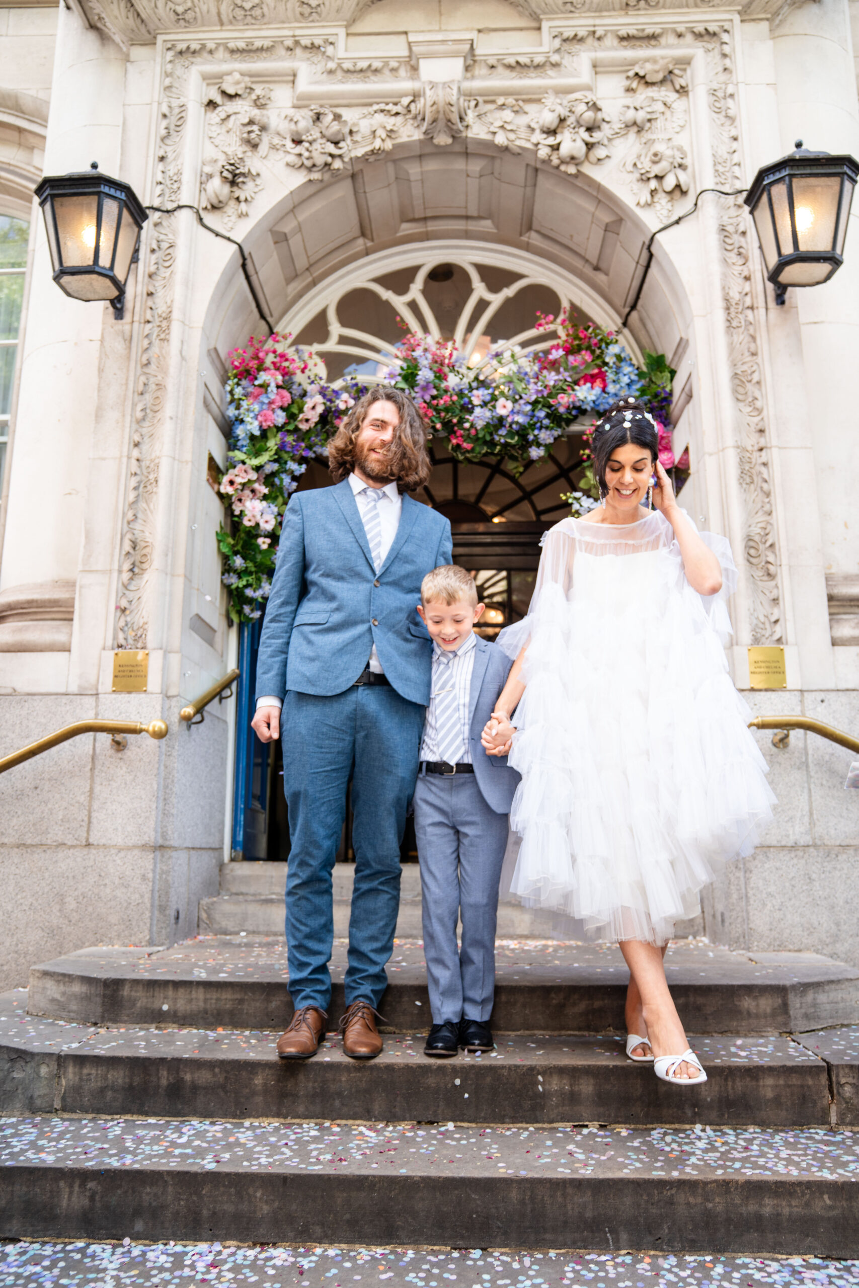 Bride and groom on the steps – Chelsea Old Town Hall wedding photographer