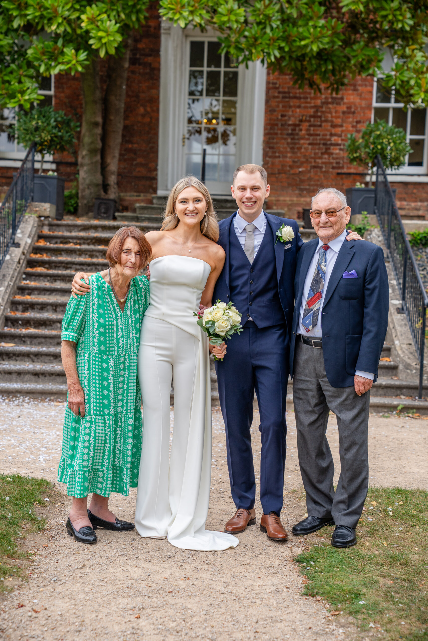 Group photo on the steps with family