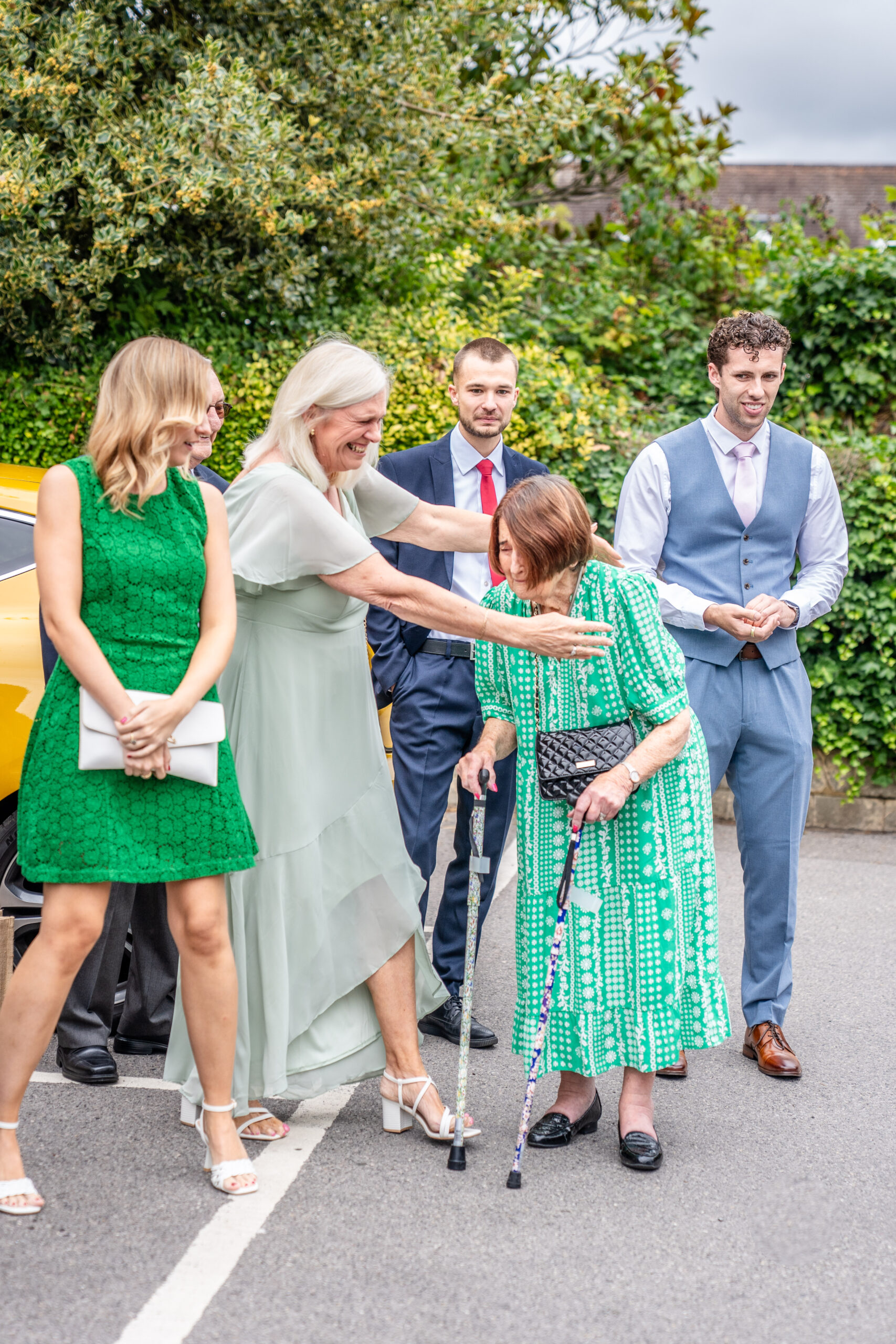 Emotional moments as bride and groom arrive in black taxi to Leatherhead registry office in Surrey