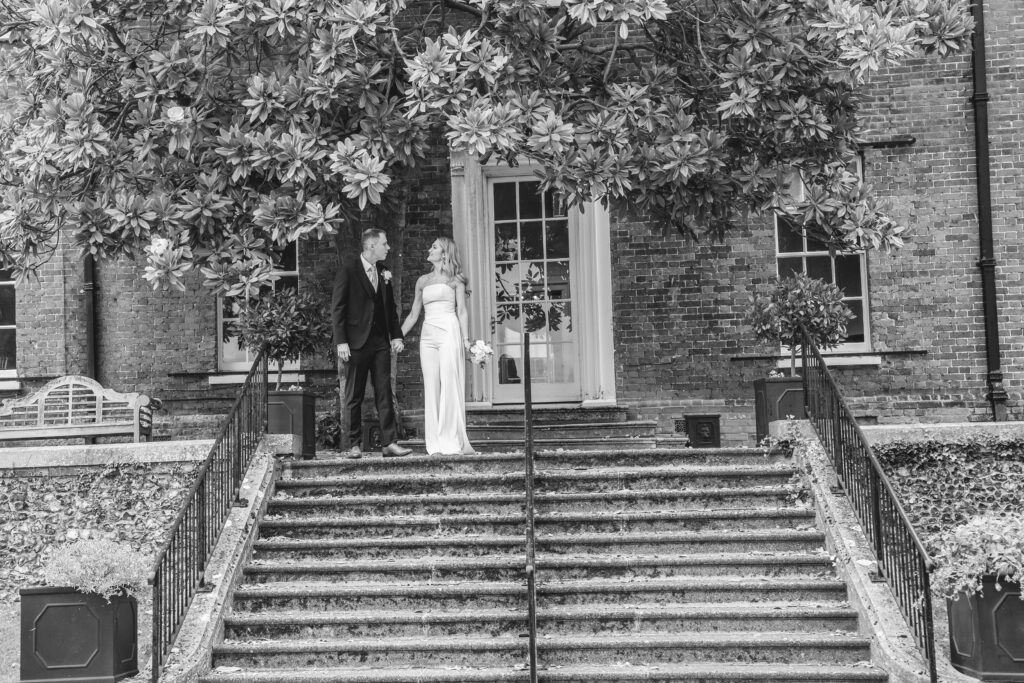 Candid documentary Surrey wedding photographer capturing bride and groom