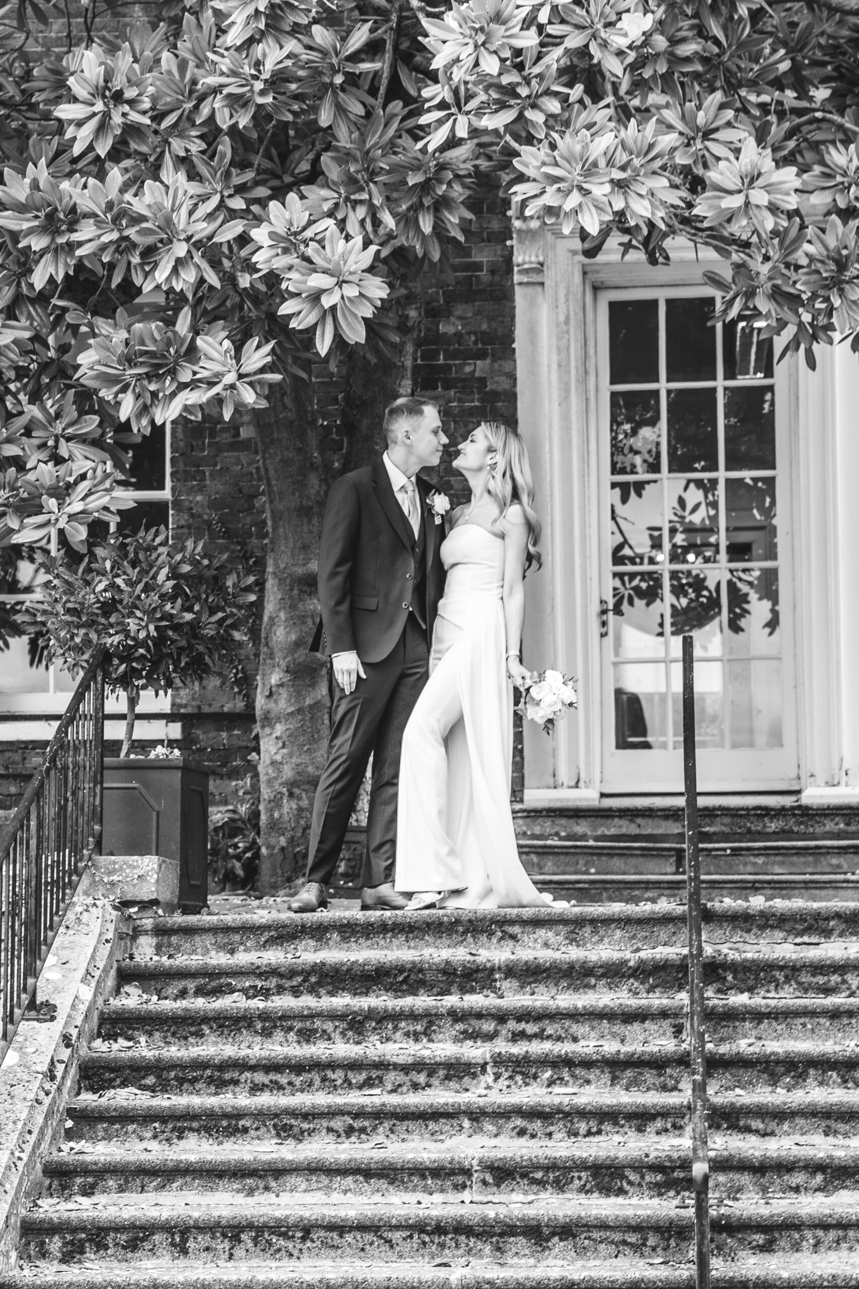 Candid documentary Surrey wedding photographer capturing bride and groom