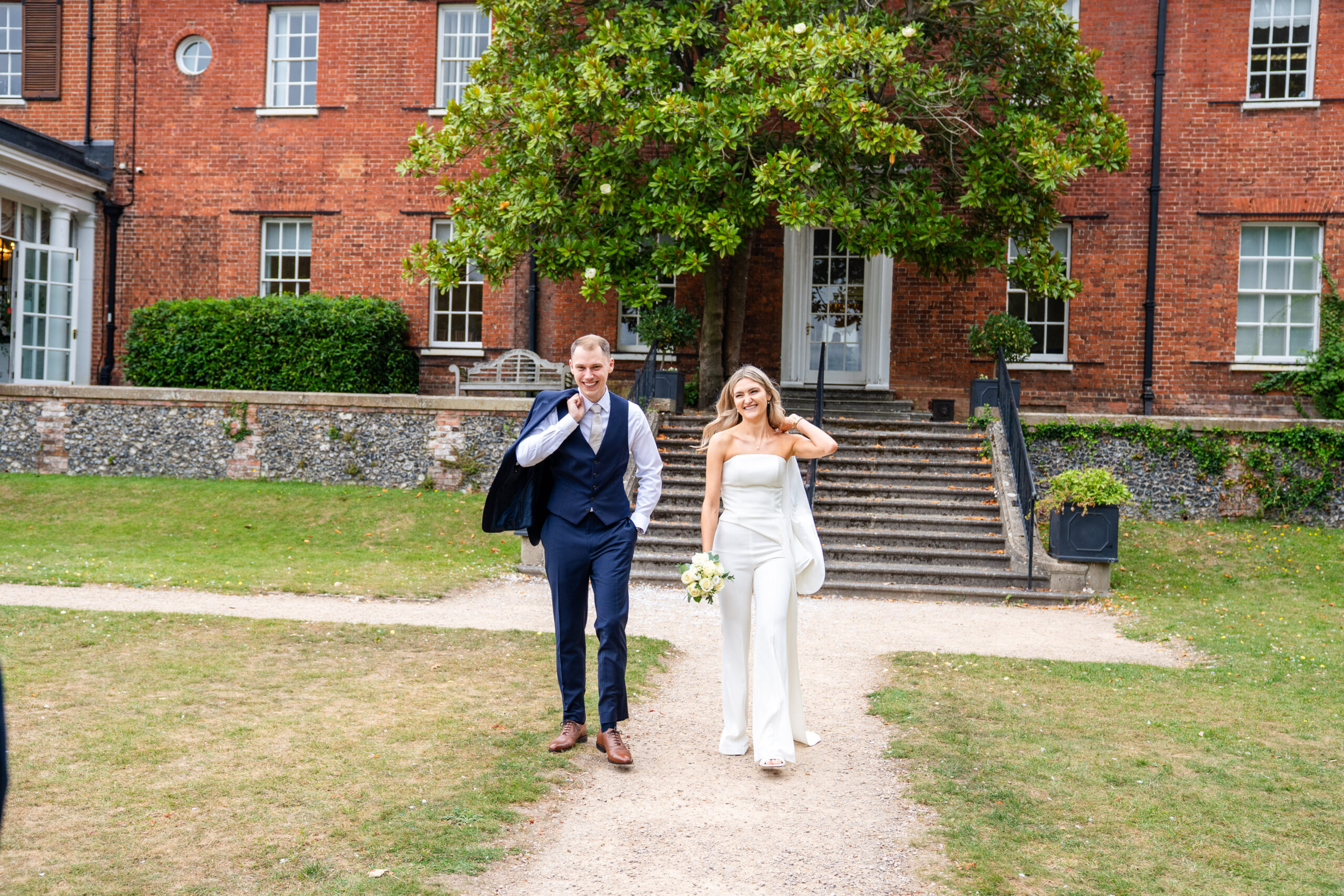 fun and relaxed couple portraits in Surrey registry office