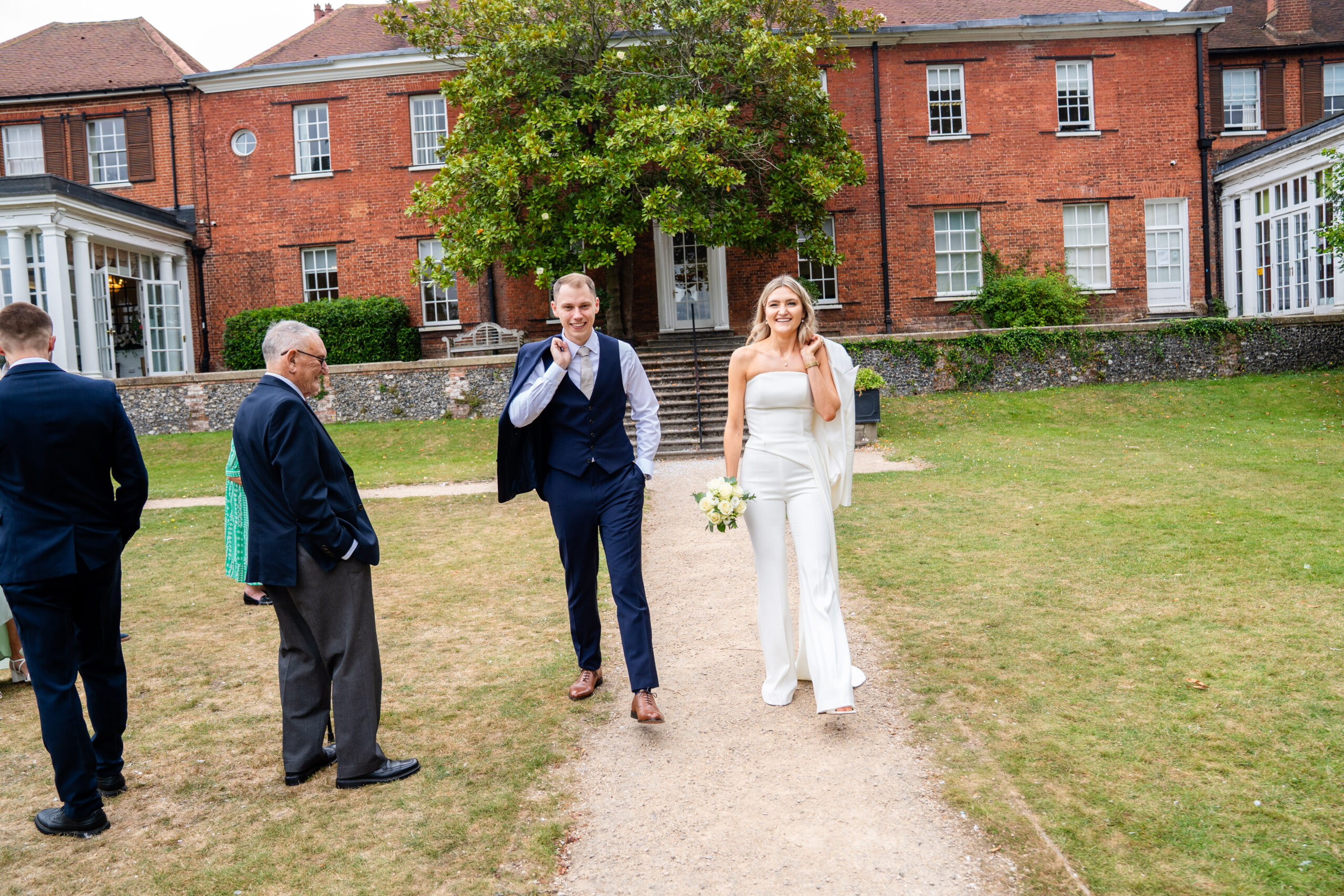 fun and relaxed couple portraits in Surrey registry office