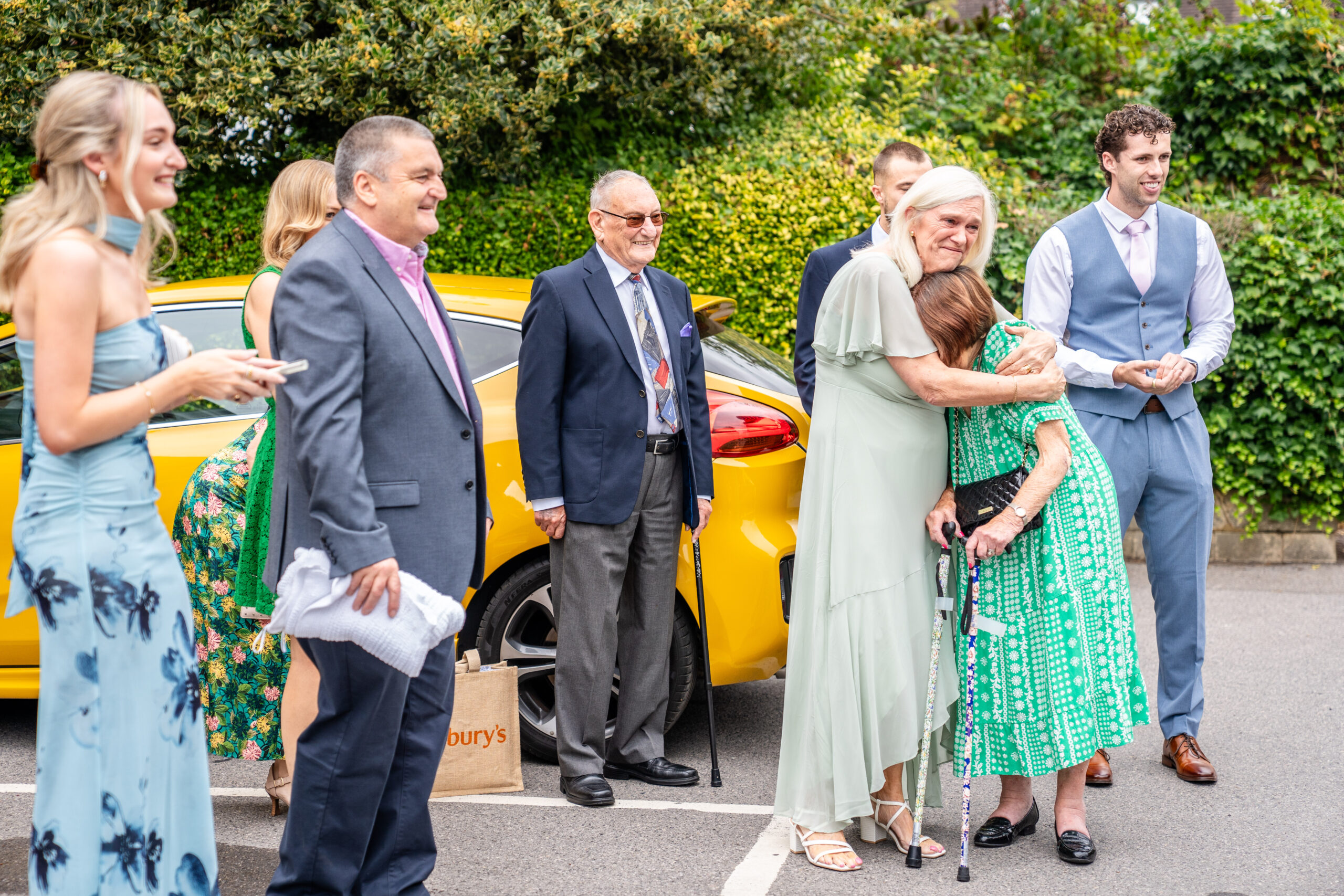 Emotional moments as bride and groom arrive in black taxi to Leatherhead registry office in Surrey