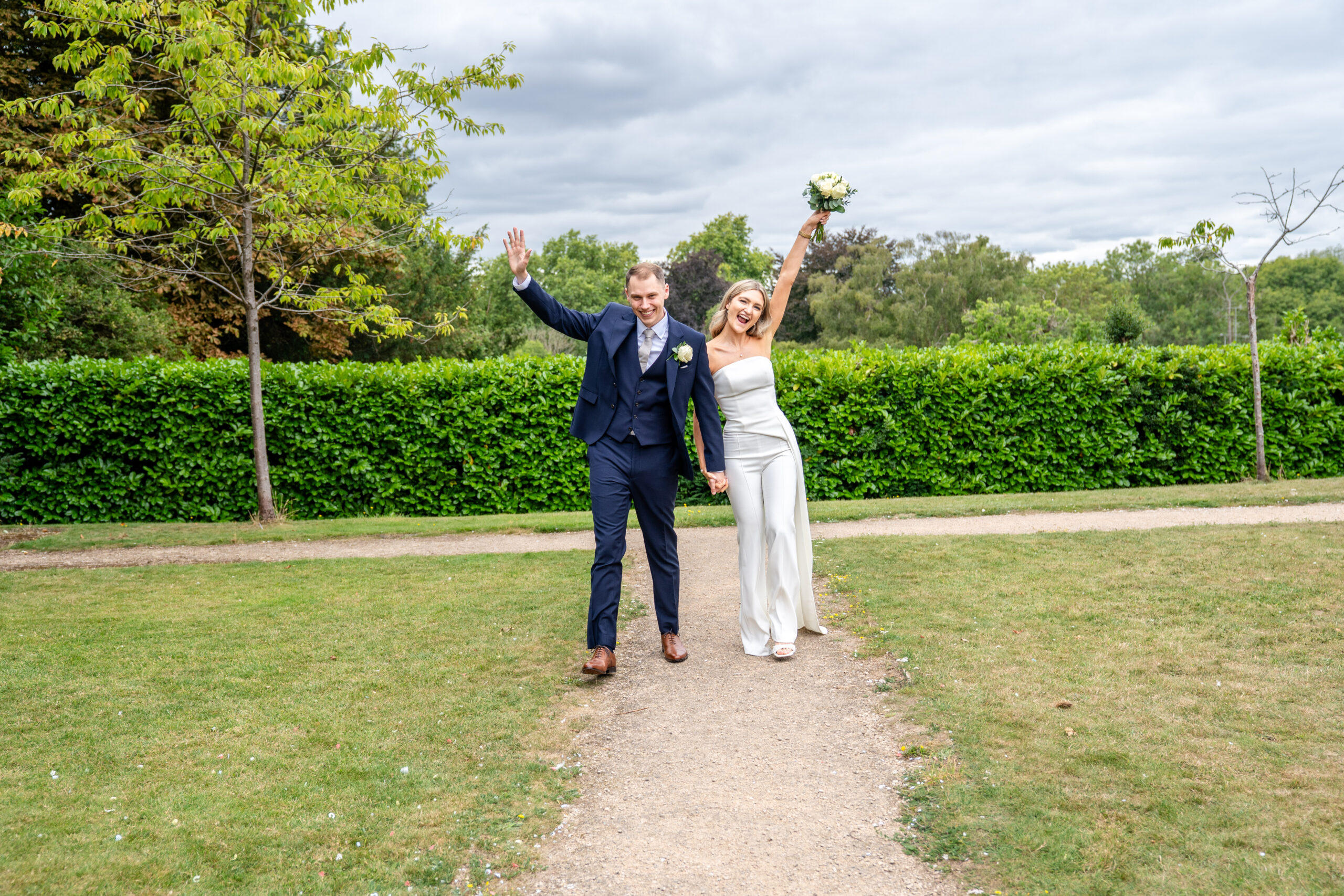couple portraits in the gardens of Leatherhead registry office