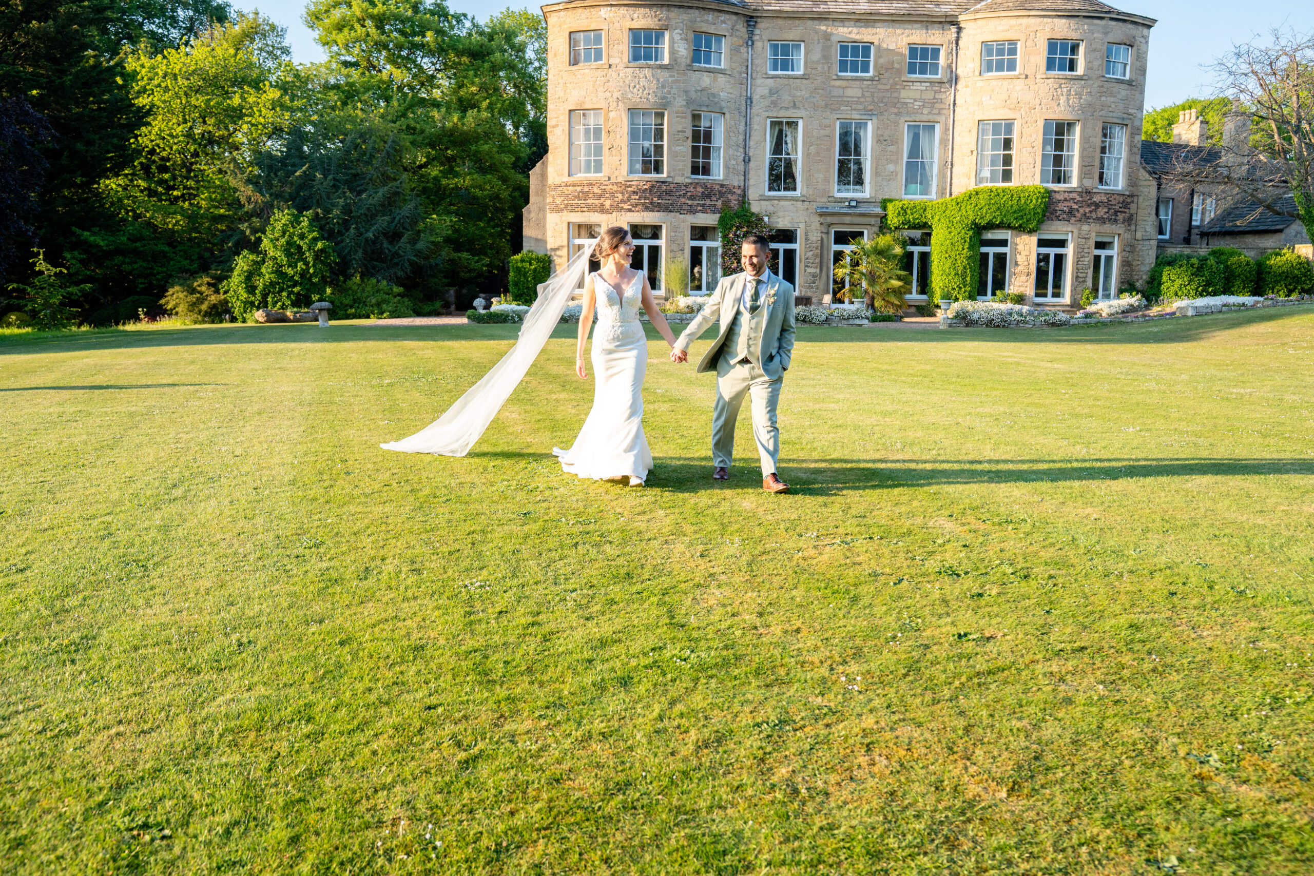 Garden portraits bride and groom in South Yorkshire wedding venue