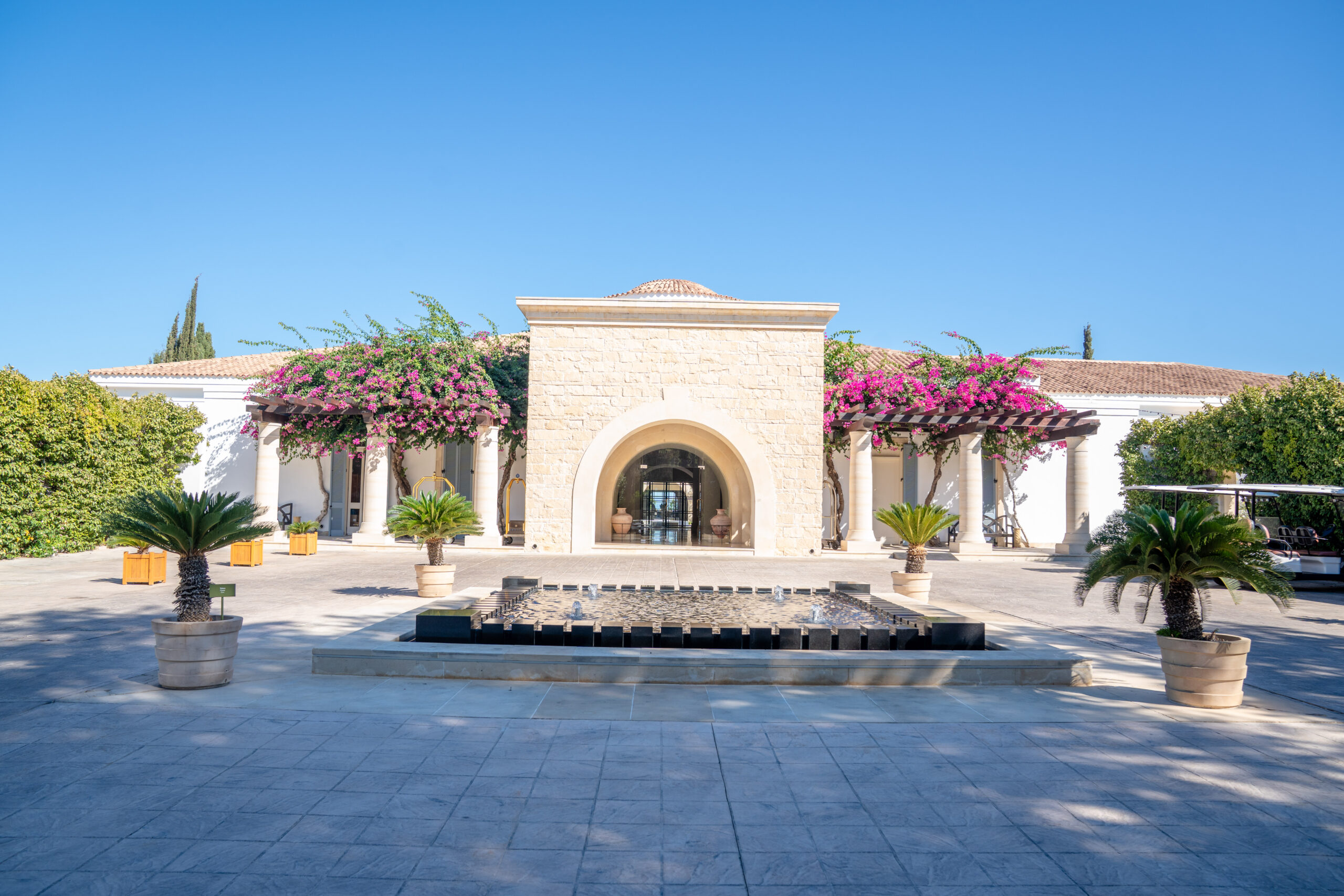 Cyprus wedding photographer photographing the outside of the Anassa Hotel