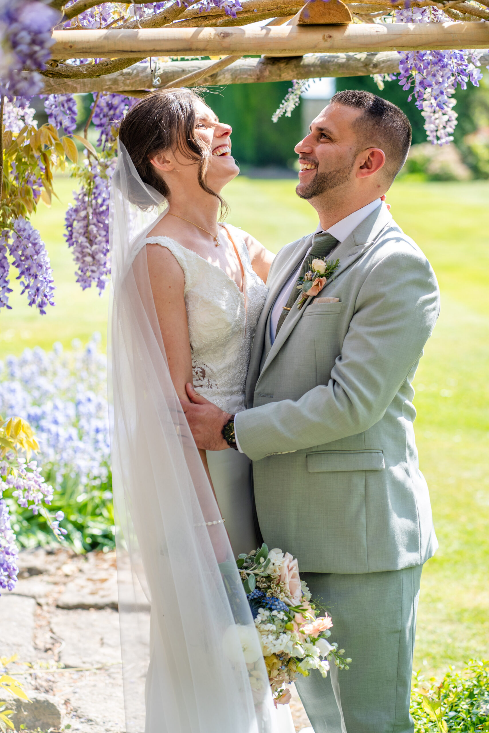 Relaxed couples portrait photographed by documentary London wedding photographer
