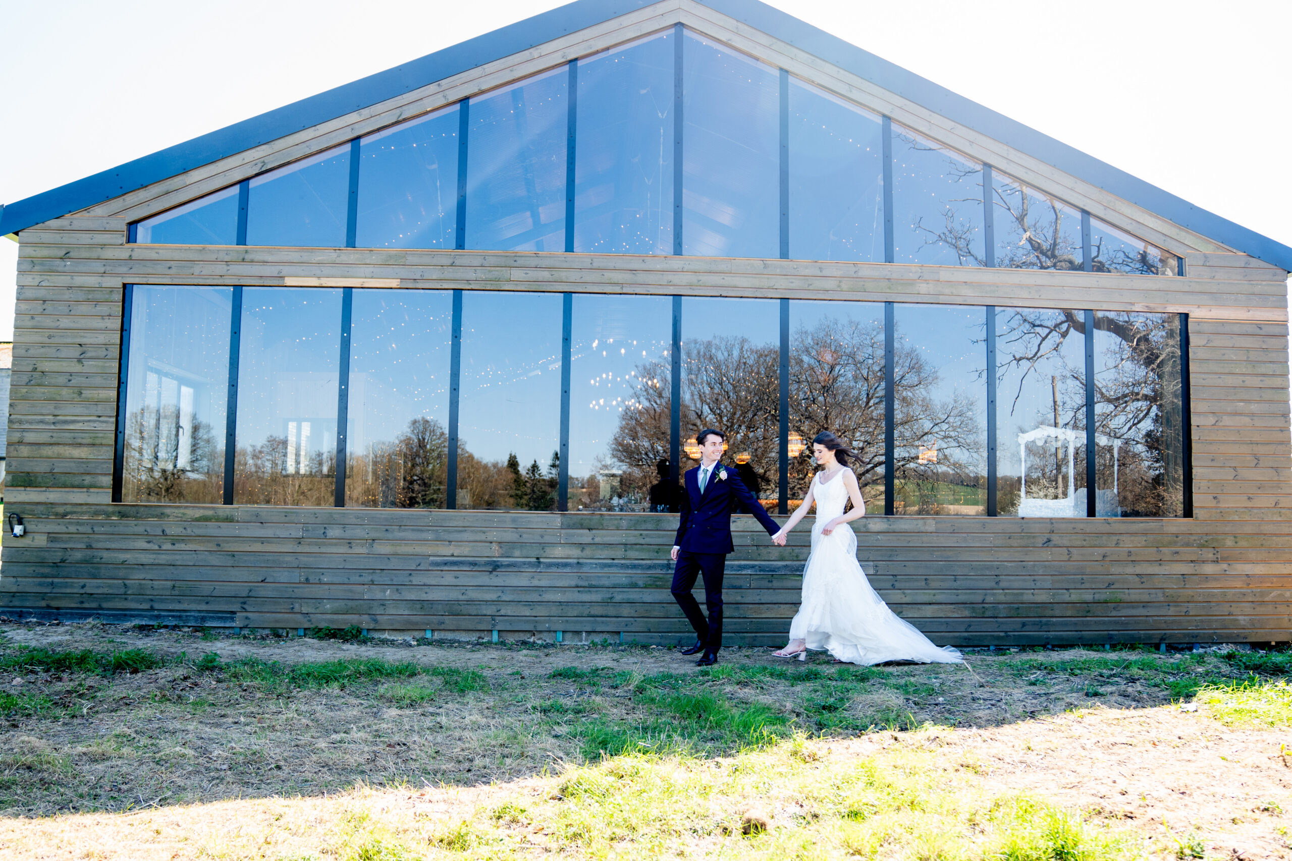 Unposed wedding couple walking together documentary wedding photography UK