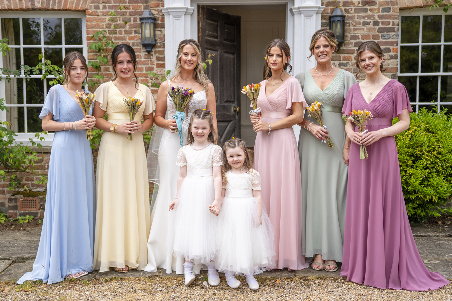 Bridsmaids portraits outside the main house of Combe Manor