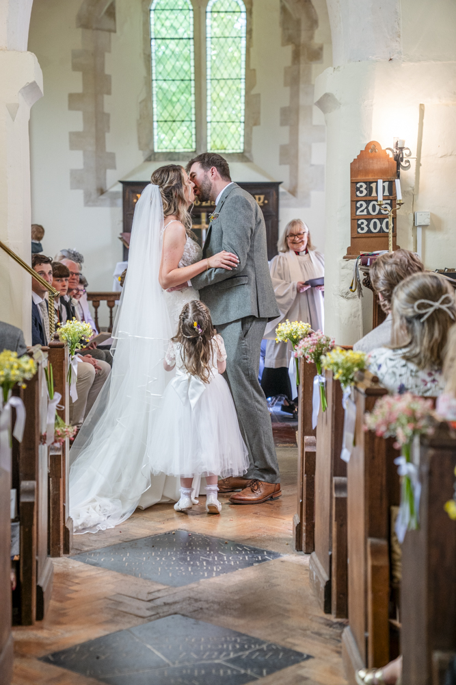 Church ceremony first kiss officially married