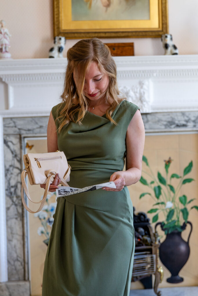 Candid moment of bridesmaids celebrating during morning preparations at a luxury manor house.